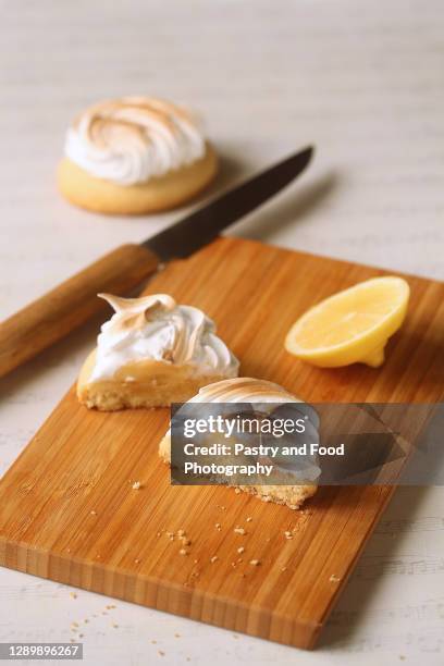 lemon cookies with italian meringue - burnt cookies stock-fotos und bilder