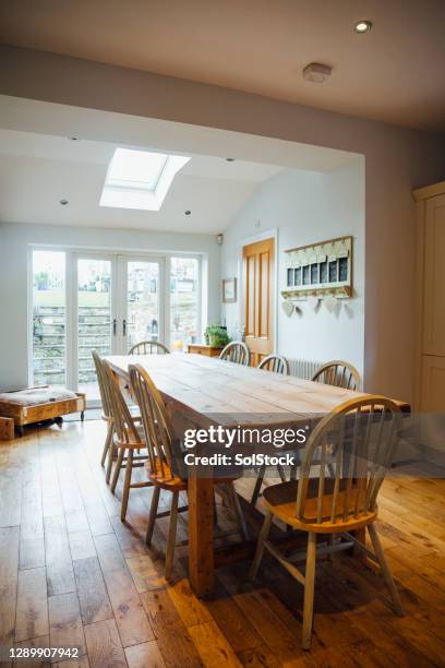 country style dining room table and kitchen - glass ceiling stock pictures, royalty-free photos & images