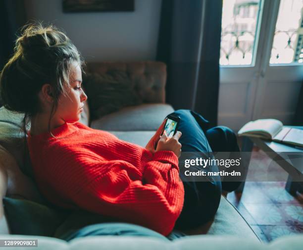 woman staying home during covid-19 pandemic - editing stock pictures, royalty-free photos & images