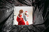 Santa throws a disposable mask in the trash. covid dissident.
