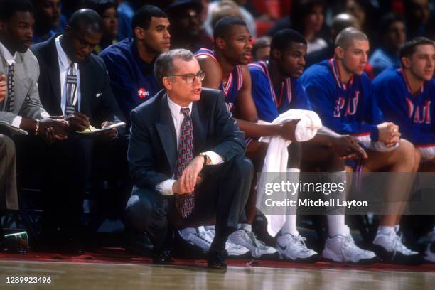 Head coach Joey Meyer of the DePaul Blue Demons looks on during a college basketball game against the Georgetown Hoyas at USAir Arena on November 30,...