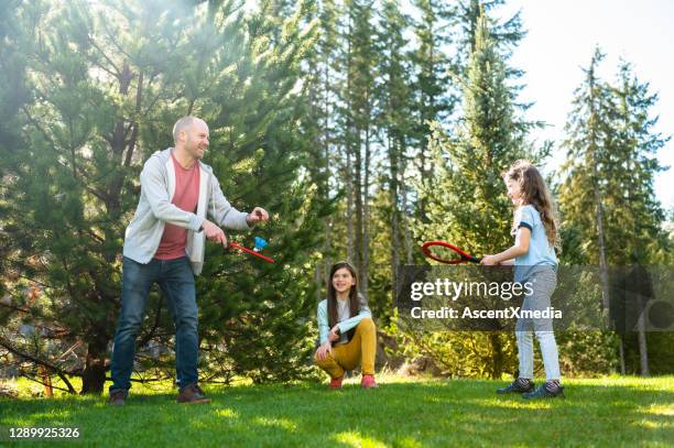 Playing Outside In Spring Family Playing Outside In Spring Photos and Premium High Res Pictures ...