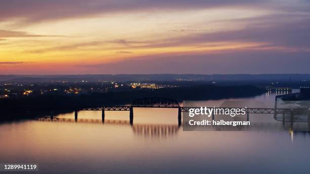 fiery sunset in kentucky from across the ohio river - indiana nature stock pictures, royalty-free photos & images