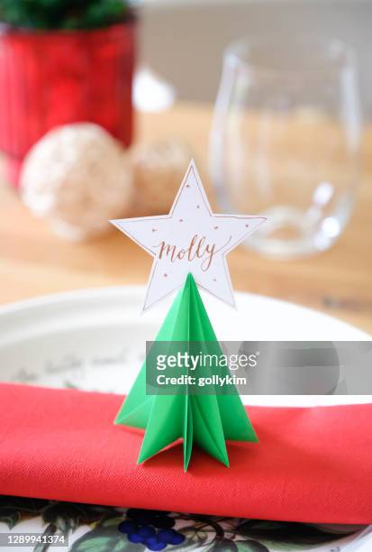 origami christmas tree place card - place card stock pictures, royalty-free photos & images