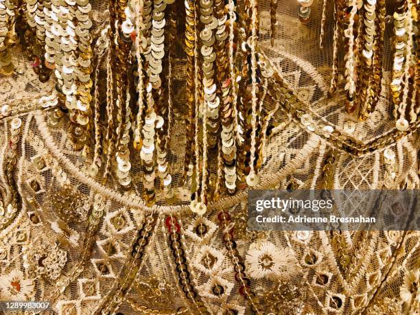 golden glamour fabric - gold fringe stock pictures, royalty-free photos & images