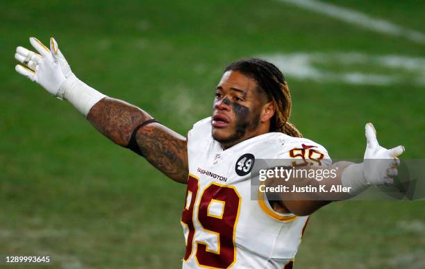 Chase Young of the Washington Football Team celebrates following their 23-17 win over the Pittsburgh Steelers at Heinz Field on December 07, 2020 in...