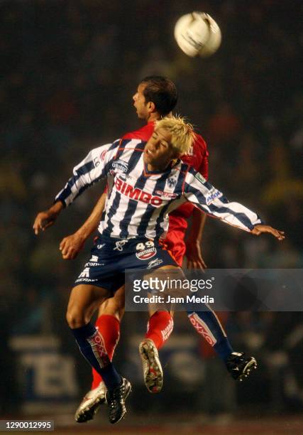 Jose Manuel Abundis of Toluca fights for the ball with Severo Meza of Monterrey during the final match of the Apertura Tournament 2005 on Dec 18,...