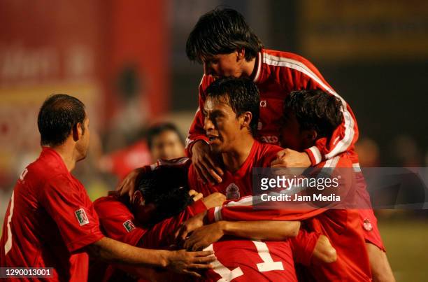Jose Manuel Bundis, Mario Mendez, Francisco Gamboa and Vicente Sanchez of Toluca celebrate during the final match of the Apertura Tournament 2005 on...