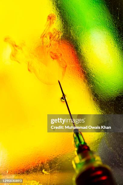 vaccine syringe - liquid crystal display stock pictures, royalty-free photos & images