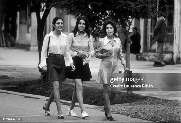 Women in Afghanistan, 1972: young students wearing mini-skirts walking down the street in city of Kabul. In the Shar-e-Naü area , a few emancipated...