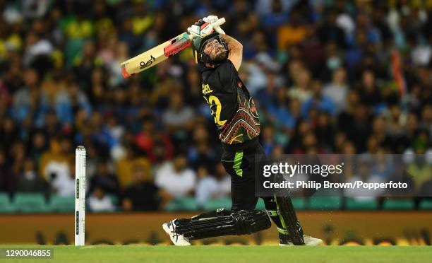 Glenn Maxwell of Australia hits out during game three of the Twenty20 International series between Australia and India at Sydney Cricket Ground on...