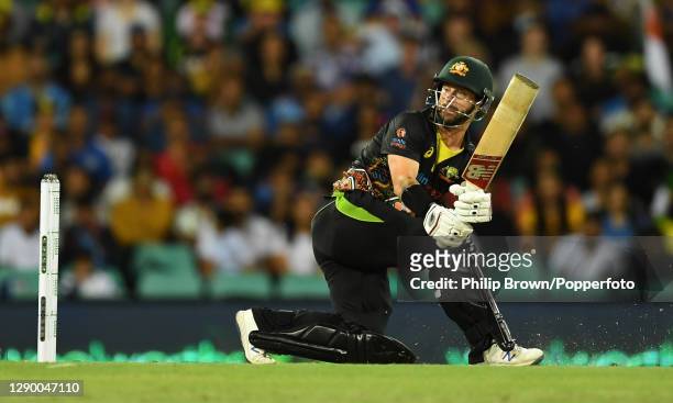 Matthew Wade of Australia hits out during game three of the Twenty20 International series between Australia and India at Sydney Cricket Ground on...