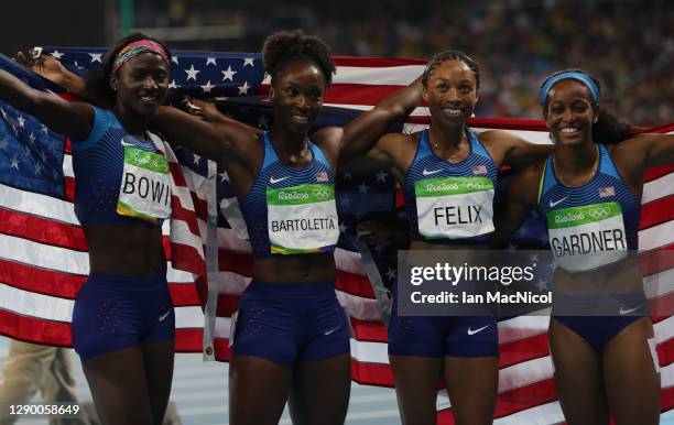 English Gardner, Allyson Felix, Tianna Bartoletta and Tori Bowie of the United States celebrate winning gold in the Women's 4 x 100m Relay Final on...