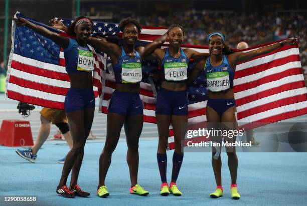 English Gardner, Allyson Felix, Tianna Bartoletta and Tori Bowie of the United States celebrate winning gold in the Women's 4 x 100m Relay Final on...