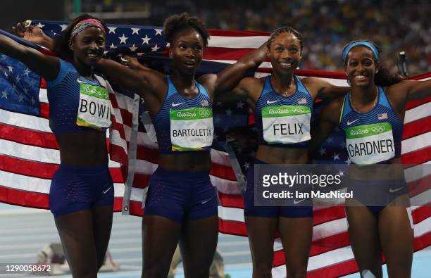 English Gardner, Allyson Felix, Tianna Bartoletta and Tori Bowie of the United States celebrate winning gold in the Women's 4 x 100m Relay Final on...
