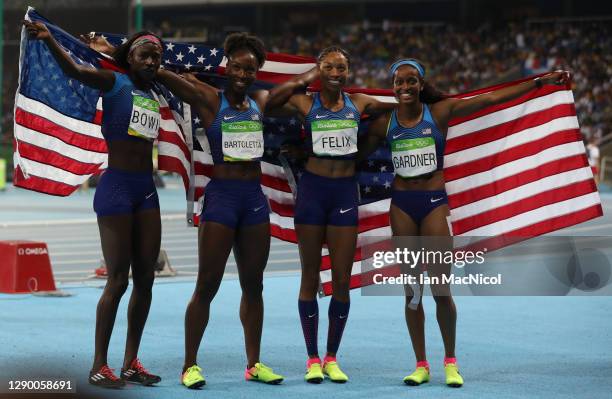 English Gardner, Allyson Felix, Tianna Bartoletta and Tori Bowie of the United States celebrate winning gold in the Women's 4 x 100m Relay Final on...