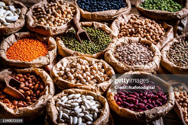 large variety of dried beans and legumes shot from above - lentils stock pictures, royalty-free photos & images