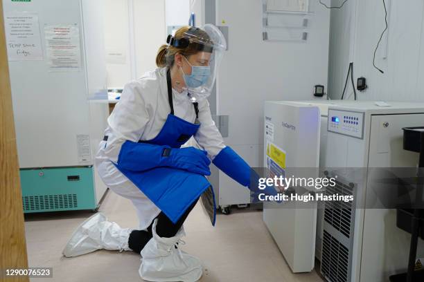 Alison Hill, Principal Pharmacist Applied Services opens one of two cryogenic freezers storing the covid-19 vaccinations at the Royal Cornwall...