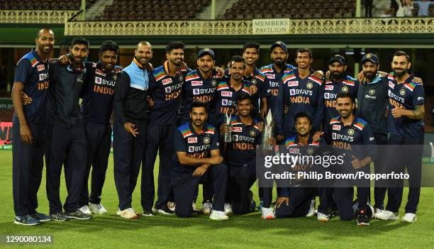 The India squad including captain Virat Kohli with the trophy after game three of the Twenty20 International series between Australia and India at...