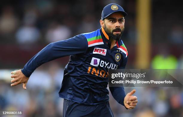 Virat Kohli of India chases the ball during game three of the Twenty20 International series between Australia and India at Sydney Cricket Ground on...