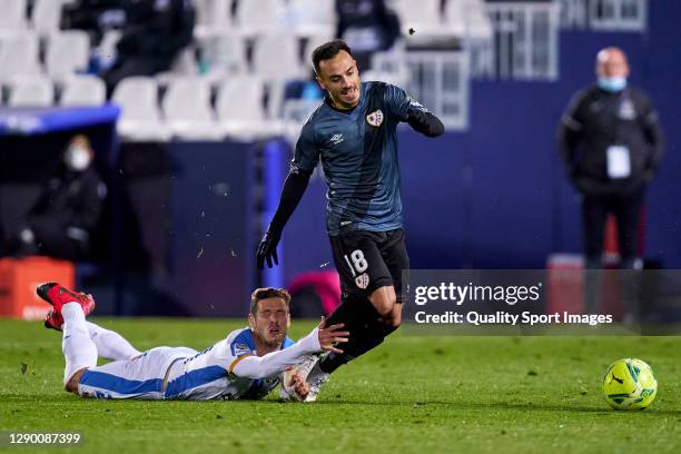 Ruben Perez of CD Leganes battle for the ball with Alvaro Garcia of Rayo Vallecano during the La Liga Smartbank match between CD Leganes and rayo...