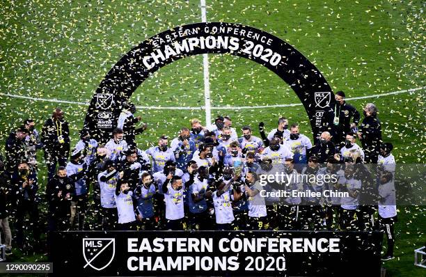 The Columbus Crew celebrate their the Eastern Conference Final win over New England Revolution during the MLS Cup Playoffs at MAPFRE Stadium on...