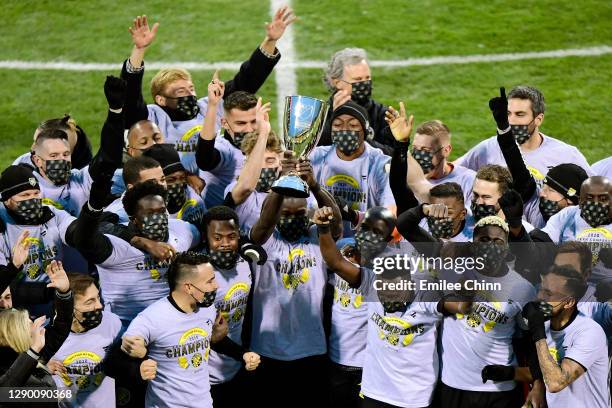 The Columbus Crew celebrate their the Eastern Conference Final win over New England Revolution during the MLS Cup Playoffs at MAPFRE Stadium on...