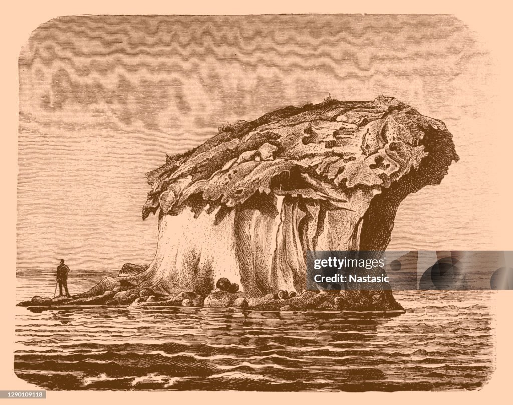 Isolated tuff island in the bay of Lacco on Ischia
