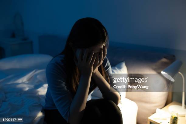 woman feel depress in bedroom - suicide stock pictures, royalty-free photos & images