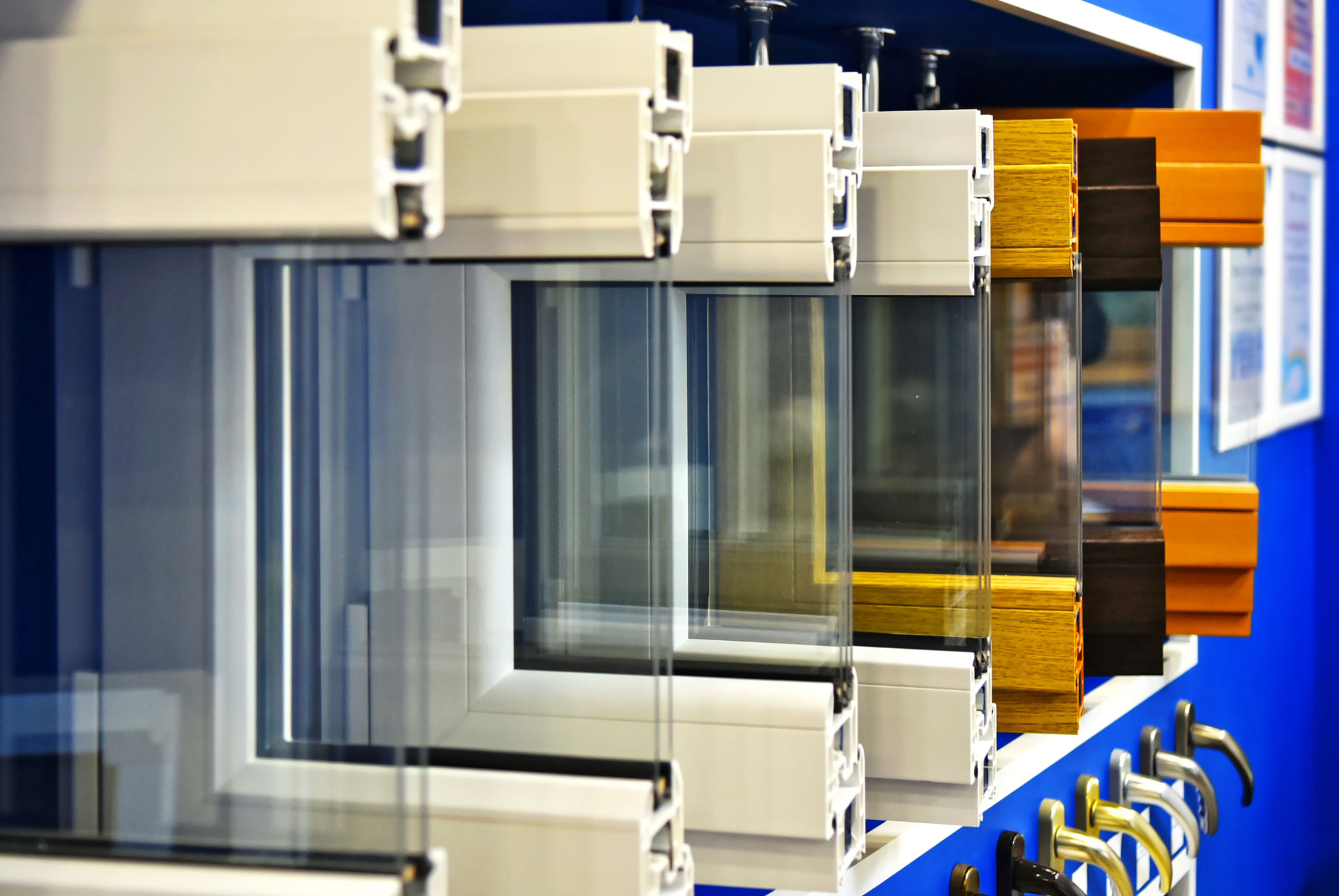 Samples of modern window profiles on a special showcase in the room. Services for the installation of Windows Samples of modern window profiles on a special showcase in the room. Services for the installation of Windows
