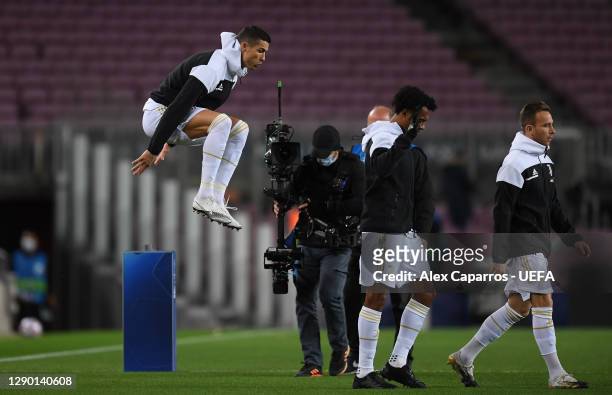 Cristiano Ronaldo of Juventus F.C. Jumps as he enters the field of play prior to the UEFA Champions League Group G stage match between FC Barcelona...