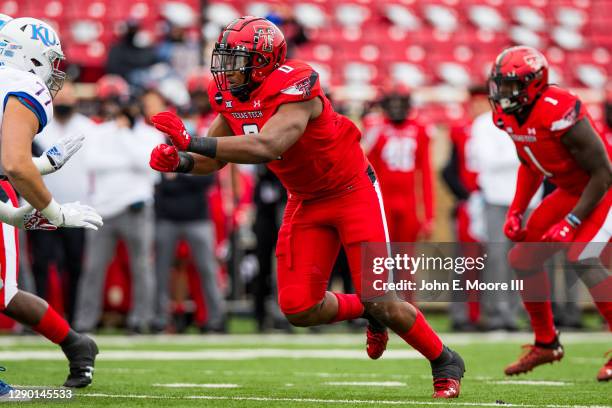 Defensive lineman Tyree Wilson of the Texas Tech Red Raiders defends during the first half of the college football game against the Kansas Jayhawks...