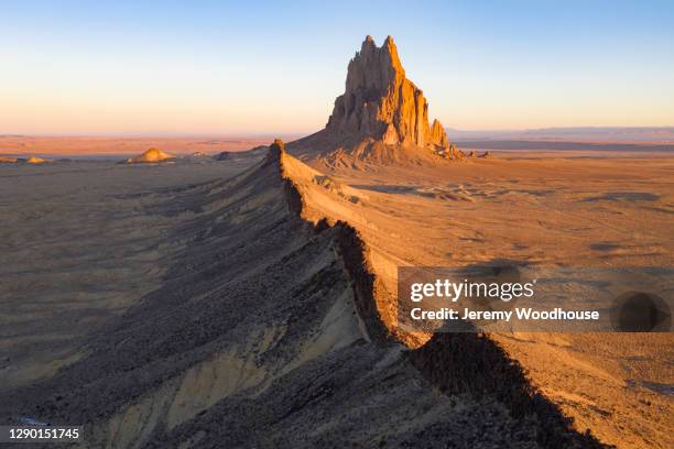 aerial view of shiprock and a volcanic dyke - shiprock fotografías e imágenes de stock