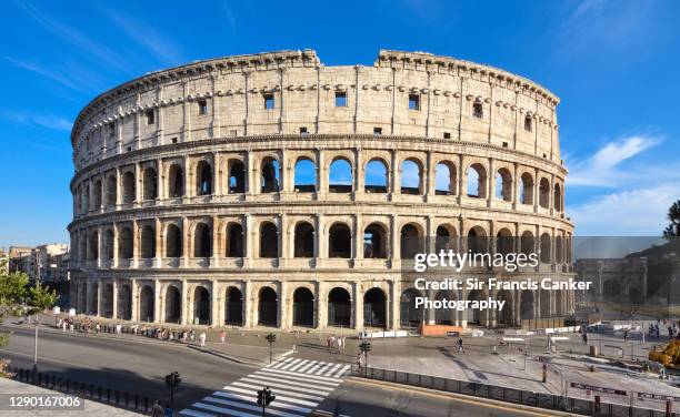 rome colosseum with arch of constantine on a sunny day with clear sky in rome, italy - arch of constantine stock pictures, royalty-free photos & images