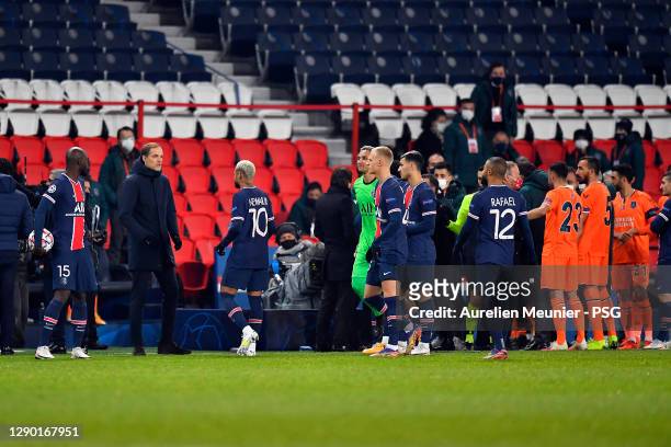 Paris Saint-Germain head coach speaks to Neymar Jr during the confusion following an alleged incident between Istanbul Basaksehir assistant manager...