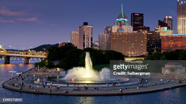 evening crowds at point state park in pittsburgh - pennsylvania stock pictures, royalty-free photos & images