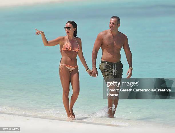 Tamara Ecclestone and boyfriend Omar Kyhami sighted on vacation on February 13, 2011 in the Maldives.