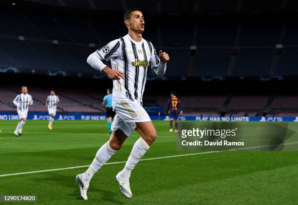 Cristiano Ronaldo of Juventus F.C. Celebrates after scoring their team's first goal from the penalty spot during the UEFA Champions League Group G...
