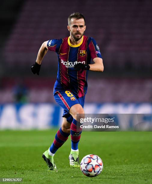 Miralem Pjanic of FC Barcelona runs with the ball during the UEFA Champions League Group G stage match between FC Barcelona and Juventus at Camp Nou...