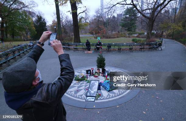 The Imagine mosaic in Strawberry Fields in Central Park is decorated with John Lennon memorabilia marking the 40th anniversary of his death as a...