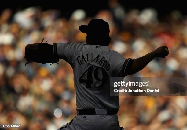 Yovani Gallardo of the Milwaukee Brewers delivers the ball against the Arizona Diamondbacks during Game Five of the National League Division Series...