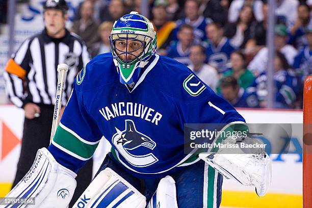 Roberto Luongo of the Vancouver Canucks defends the net against the Pittsburgh Penguins on October 6, 2011 at Rogers Arena in Vancouver, British...