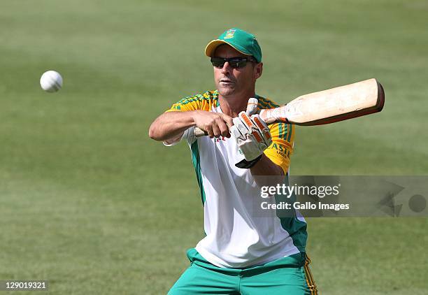 Coach Gary Kirsten of South Africa bats takes part in a team training session at Sahara Park Newlands on October 10, 2011 in Cape Town, South Africa,