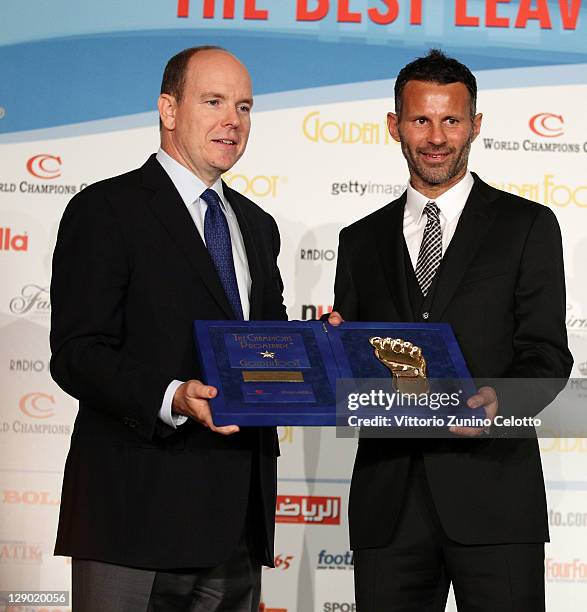 Prince Albert II of Monaco and football legend Ryan Giggs attend the Golden Foot Ceremony Awards on October 10, 2011 in Monaco, Monaco.