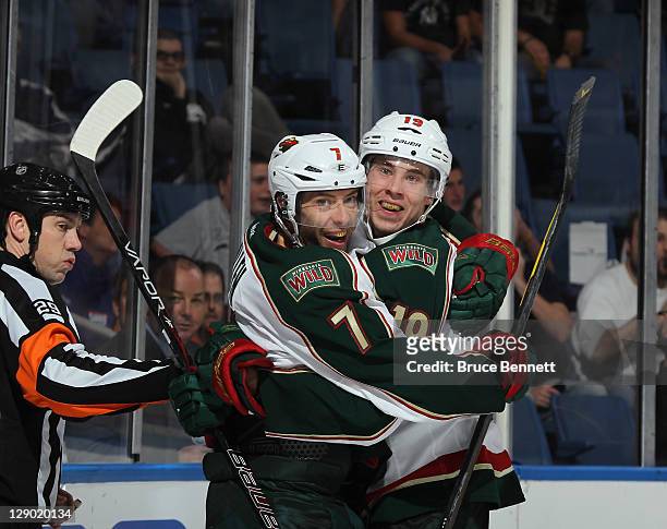 Matt Cullen of the Minnesota Wild scores at 1:13 of the third period against the New York Islanders and is joined by Brett Bulmer at Nassau Veterans...