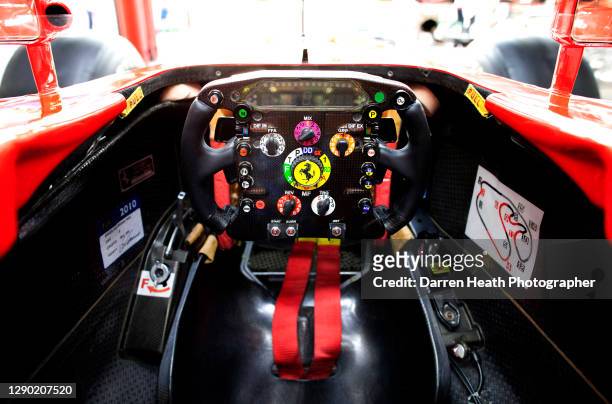 Spanish Ferrari Formula One racing driver Fernando Alonso's Ferrari F10 racing car's steering wheel in the Ferrari pit garage during practice for the...