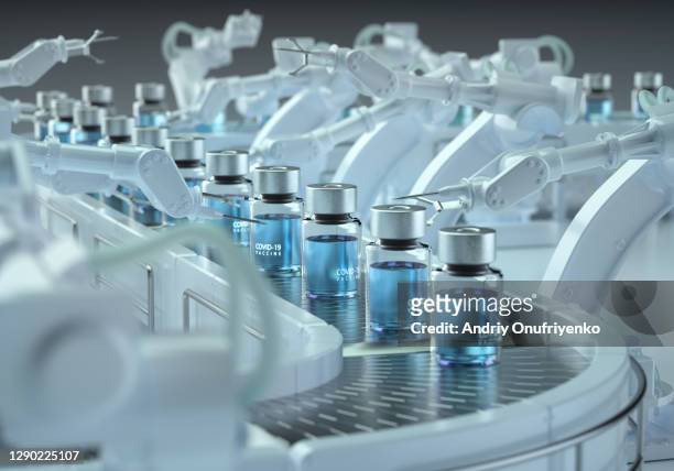 covid-19 vaccine production line. - pharmaceutical stock-fotos und bilder