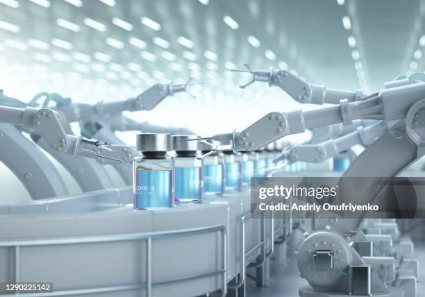 covid-19 vaccine production line. - drug manufacturing stock pictures, royalty-free photos & images