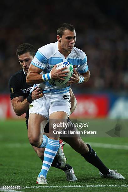 Cory Jane of the All Blacks tackles Juan Jose Imhoff of Argentina during quarter final four of the 2011 IRB Rugby World Cup between New Zealand and...