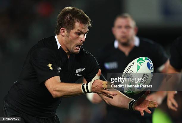 Richie McCaw of the All Blacks catches the ball during quarter final four of the 2011 IRB Rugby World Cup between New Zealand and Argentina at Eden...